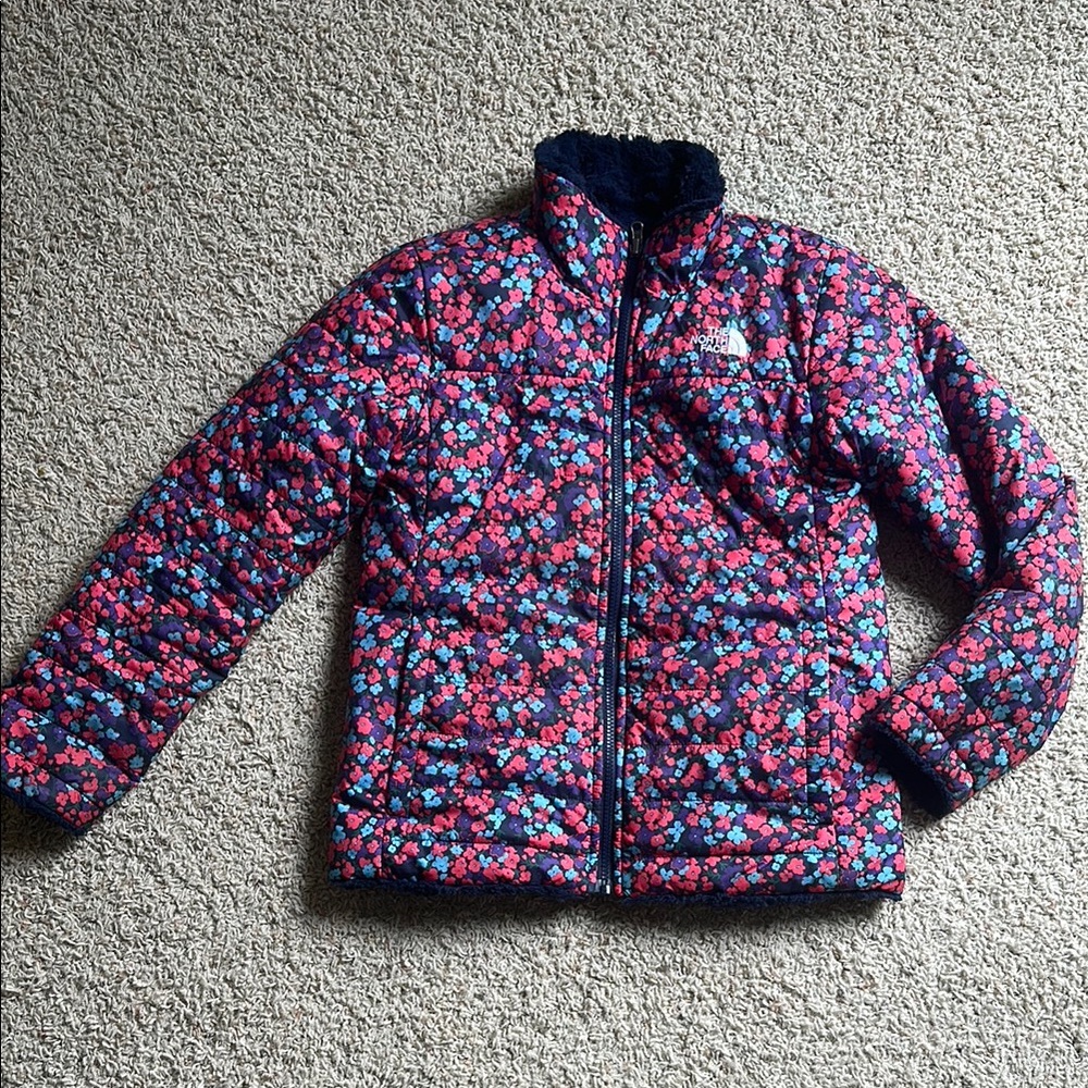 The North Face Floral Puffer Jacket with fuzzy soft reversible Navy Blue side